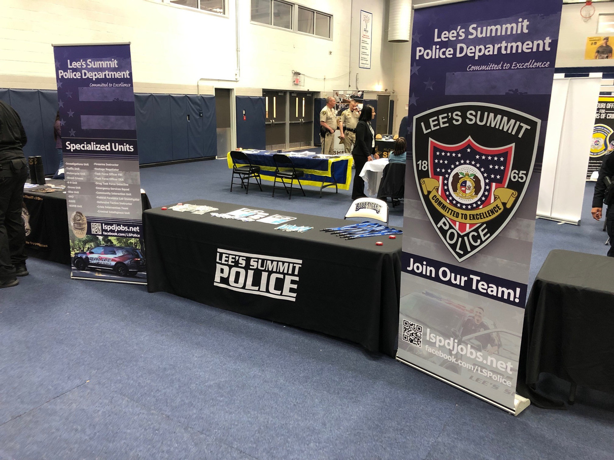Lee's Summit Police Banner Stands and Table Arrangement for Fair